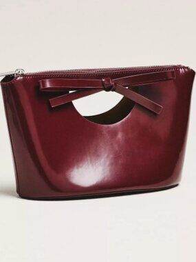 Studio Amelia Sofia Leather Bow Clutch - Anthropologie